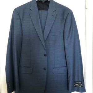 Jos. A Banks Traveler’s Collection Blue Solid Suit